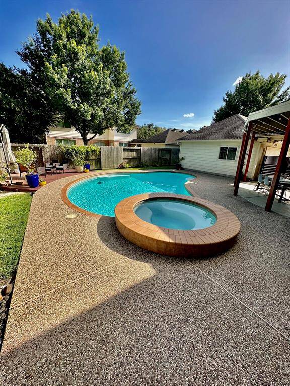 Stunning pool with attached deck