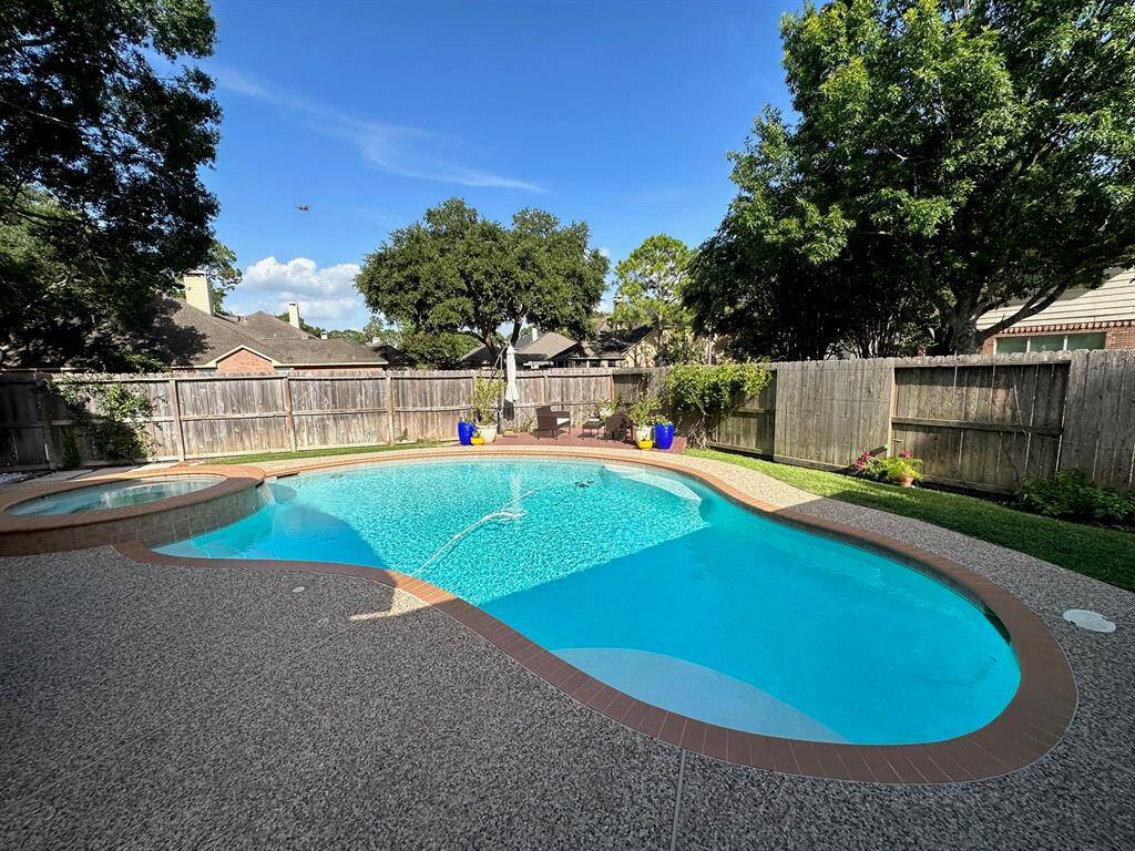 Stunning pool with attached deck