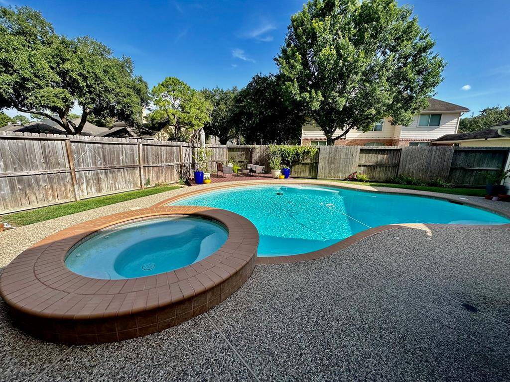 Stunning pool with attached deck