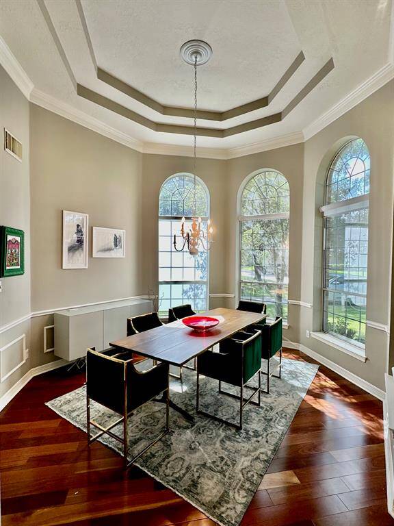 Stunning tiered ceiling dining room