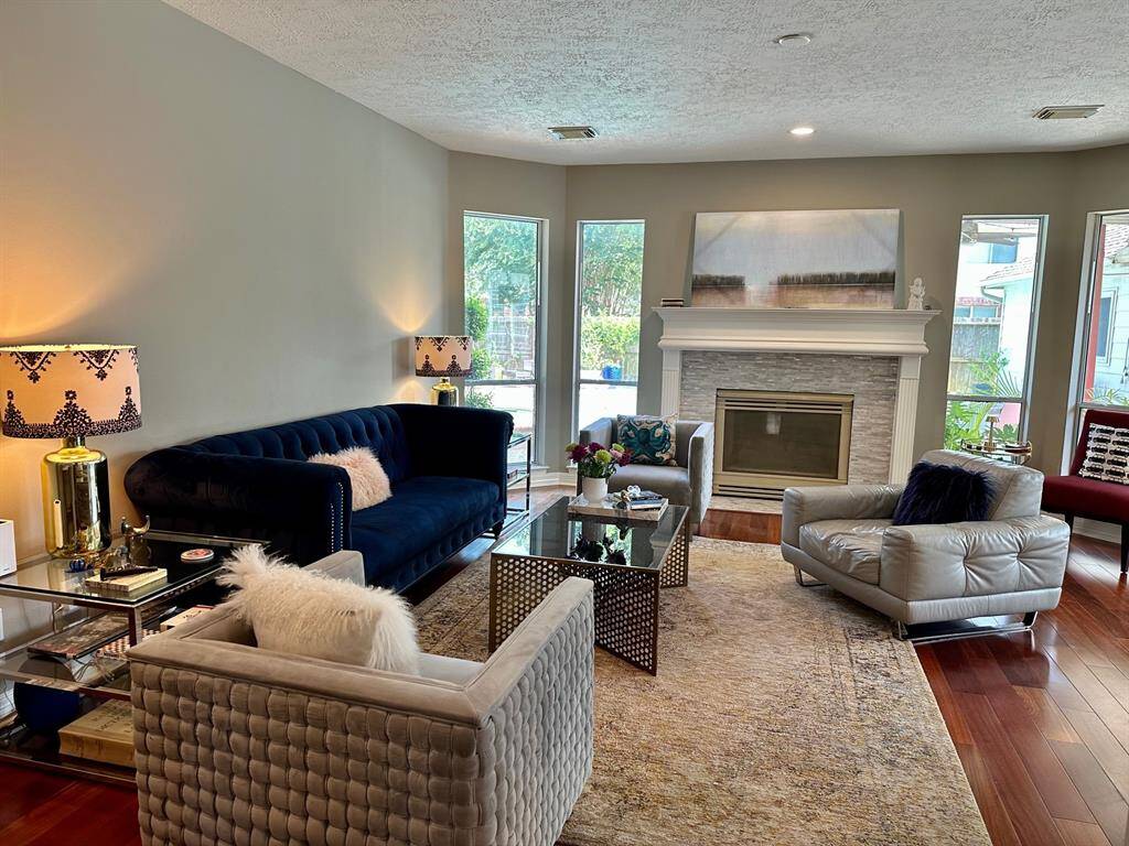Large inviting living room with fireplace