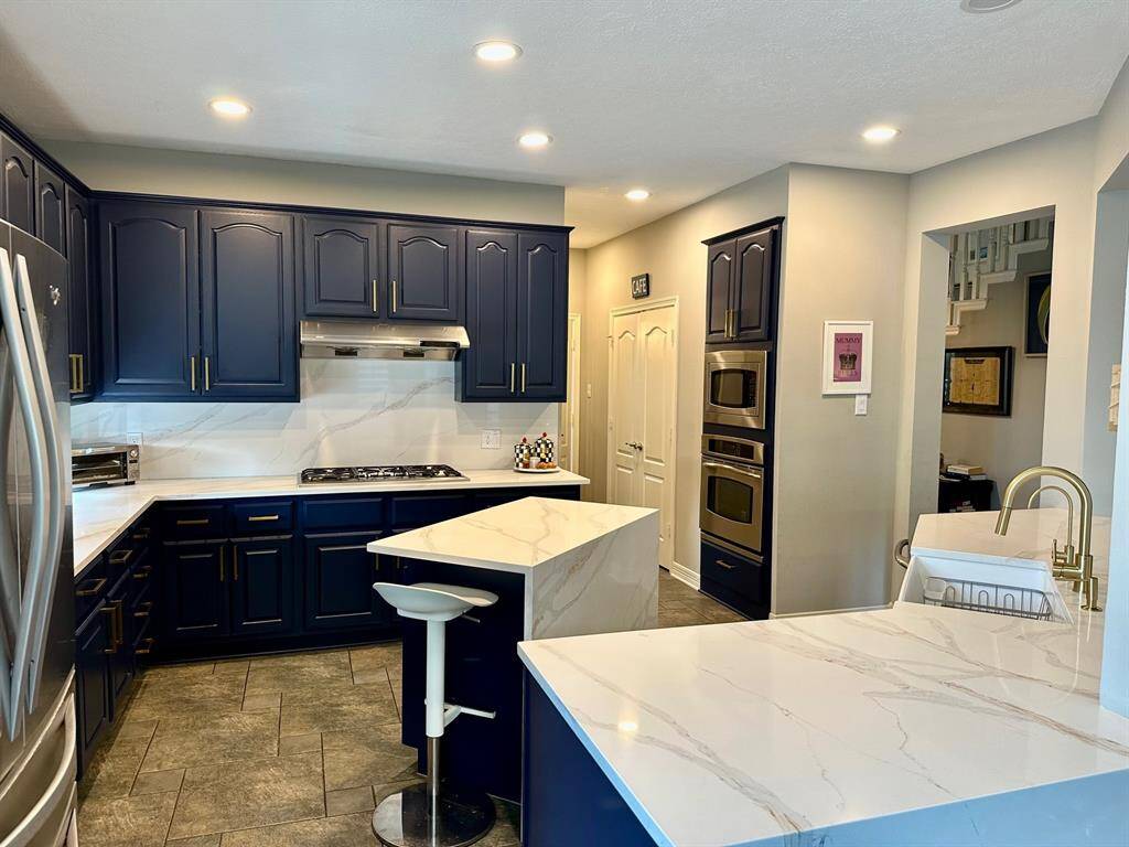 Newly updated kitchen with waterfall island