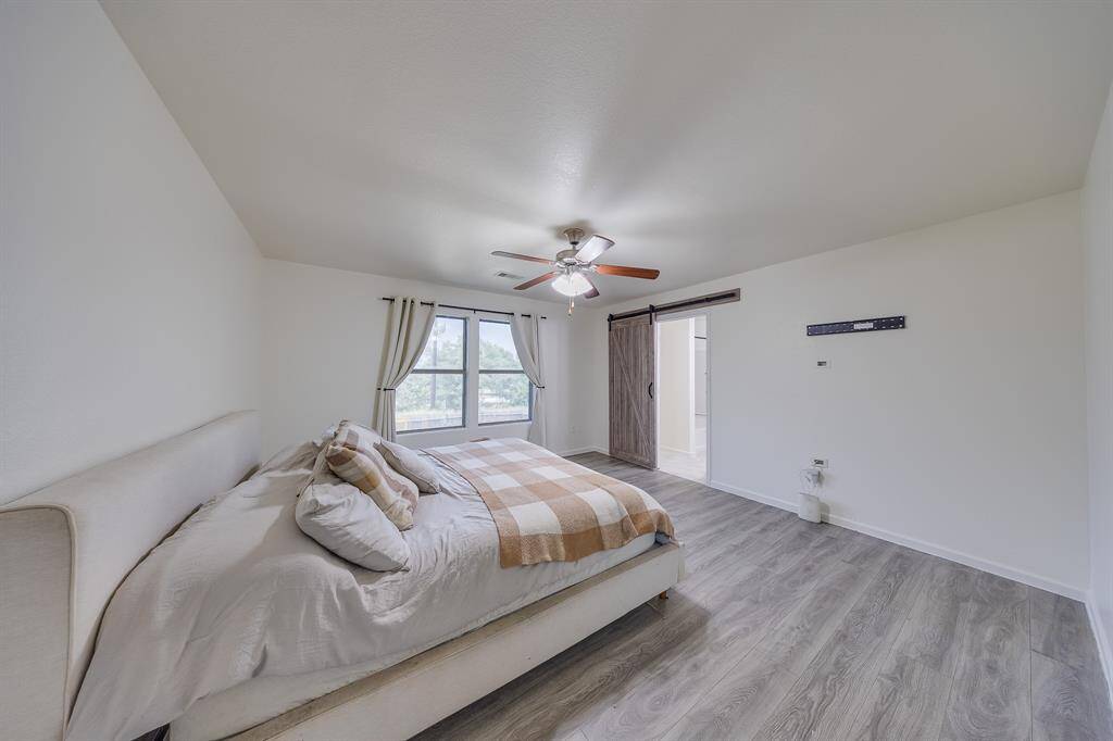 Primary bedroom located on the second floor certainly adds privacy.