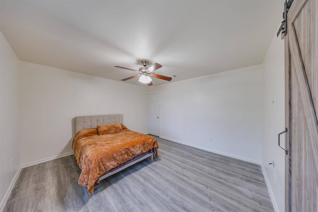 The ceiling fan in bedroom #2 provides comfortable airflow and helps keep the room cool.