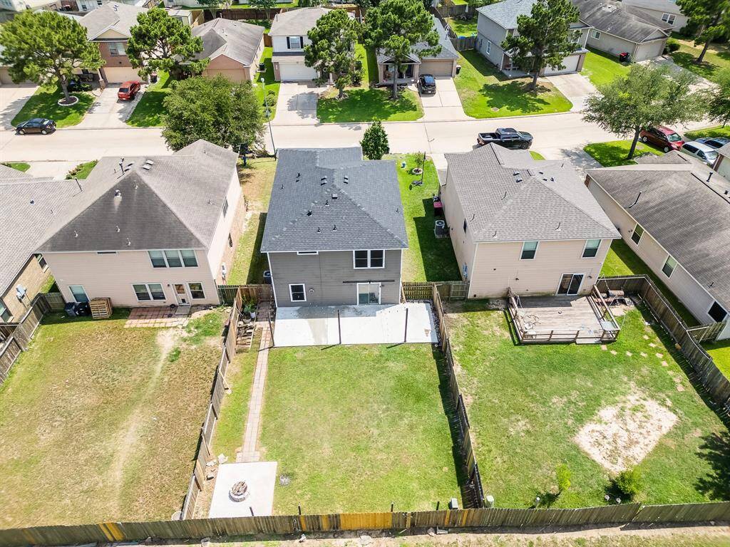 Fully fenced backyard provides privacy and security, ideal for kids, pets, and outdoor enjoyment.