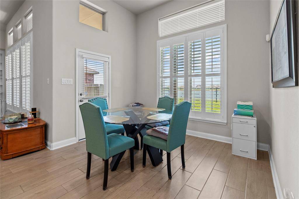 Breakfast room overlooking back yard and lake!
