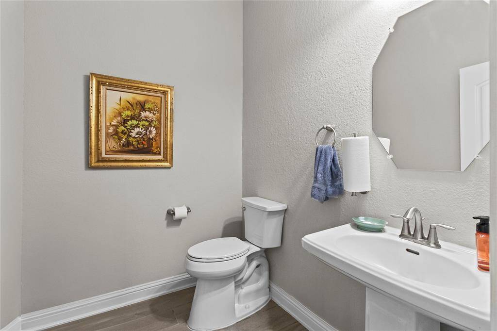 Extra 1/2 bath with chair height commode