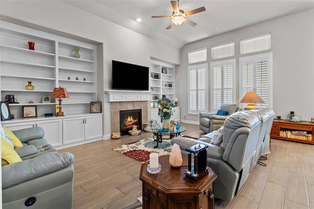 Family room with built in bookcase and display area