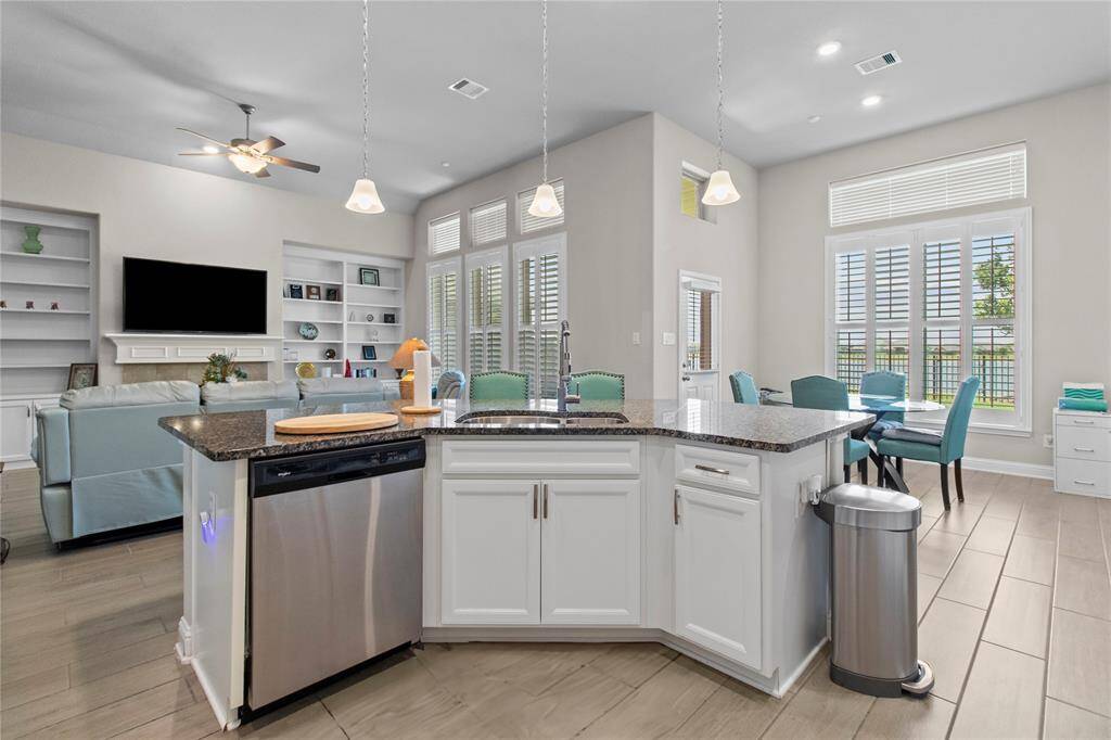 Kitchen overlooks your family room and guests!