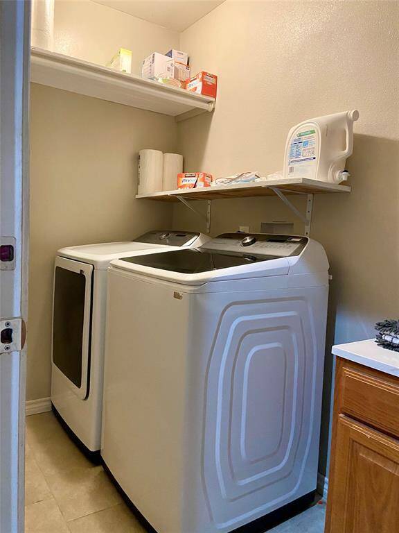 Laundry room located downstairs inside