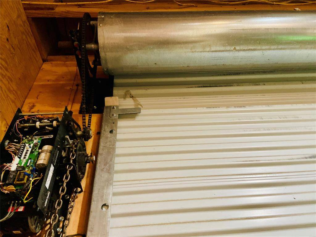 Automatic commercial roll up metal door