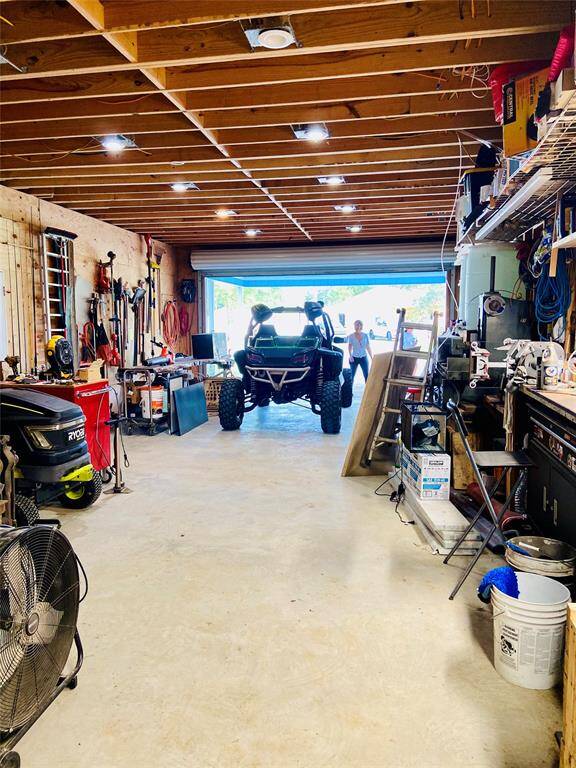 View from back door to front of garage and workshop…every man’s dream!