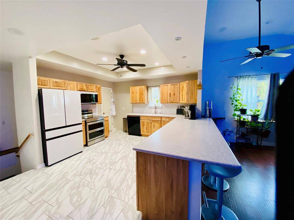 The kitchen is open to the living room