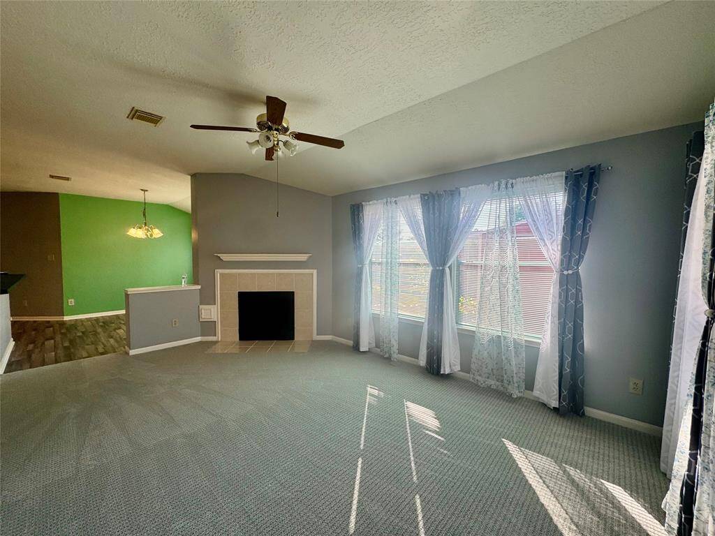 Family room with fireplace.
