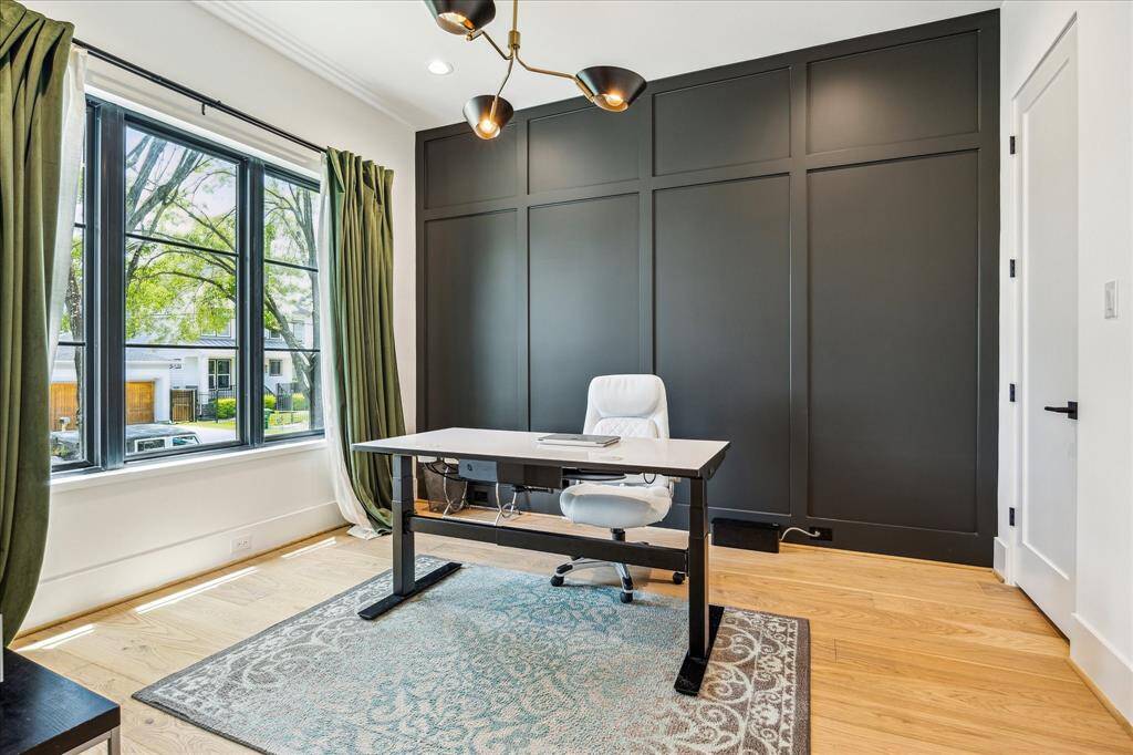 Versatile first-floor study/ office with a closet, suitable for use as a bedroom.