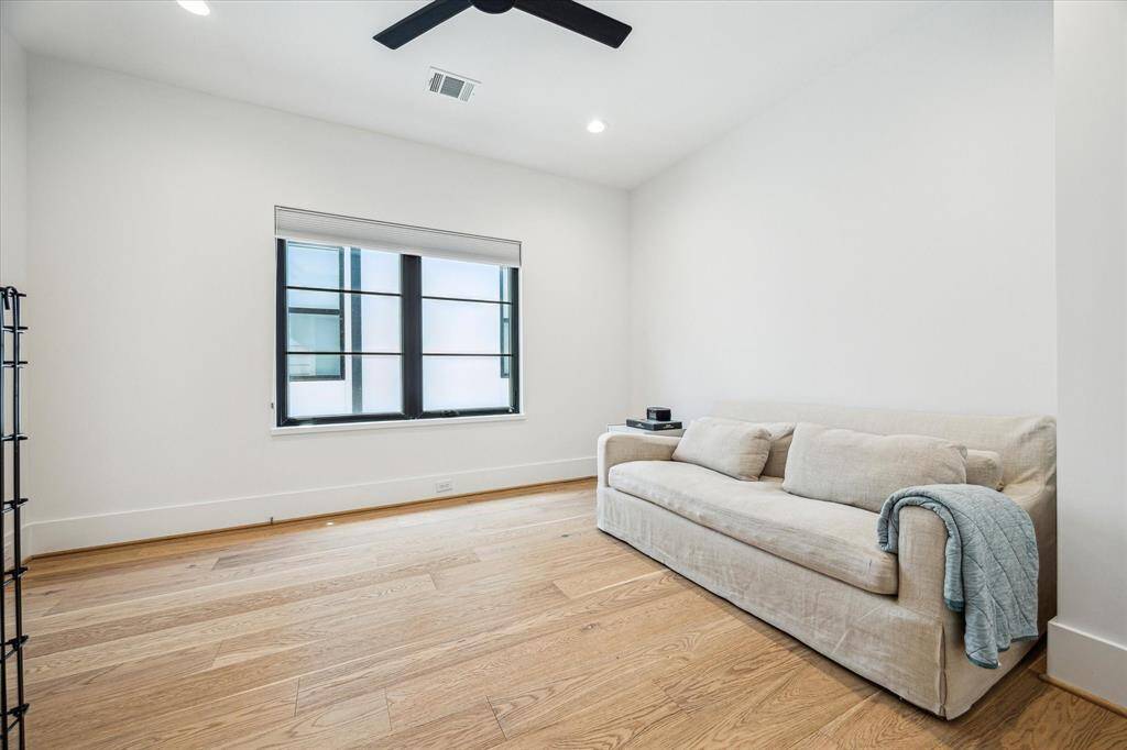 Third bedroom on the second floor has an en-suite bath and walk-in closet.