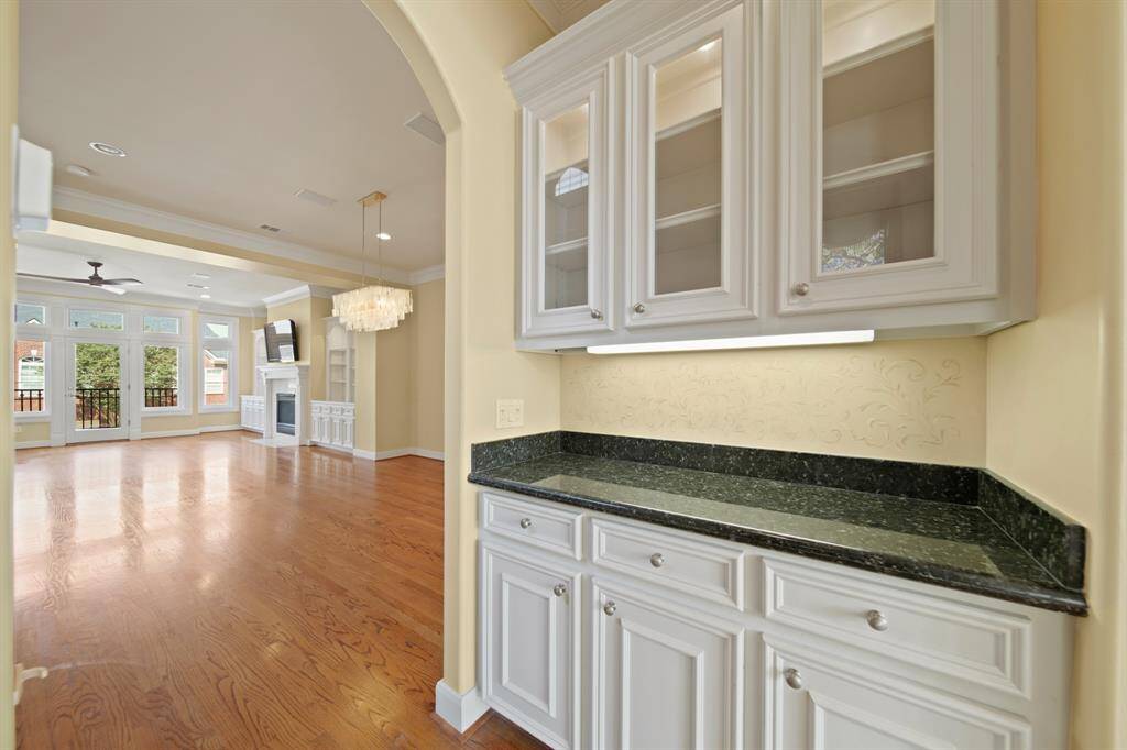 Charming first-floor powder room for added convenience.