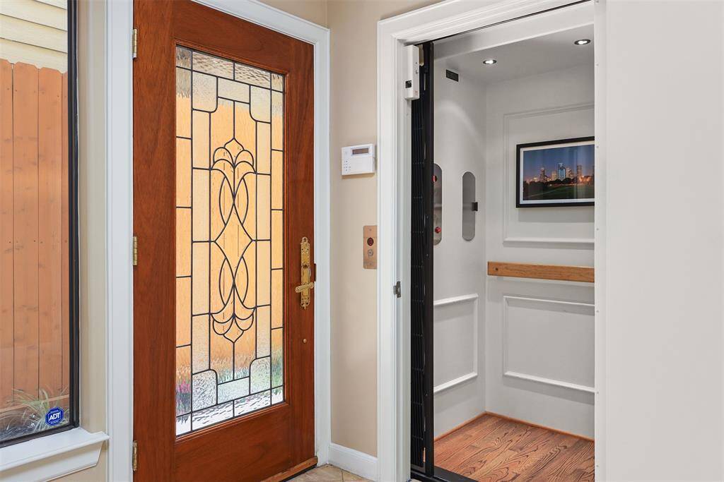 Effortlessly glide between all three floors with this spacious elevator.