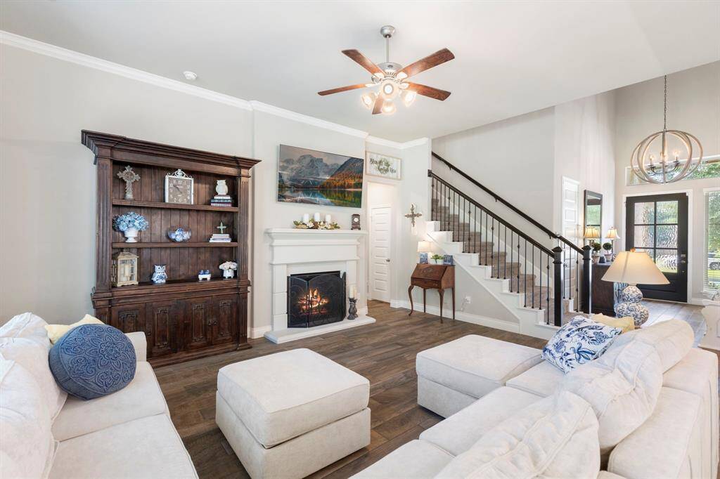 The living room offers enough space for an extra large sectional and entertainment center.