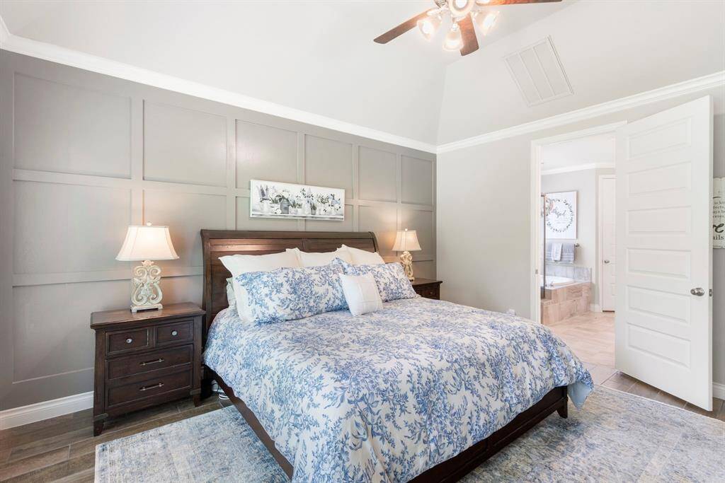 Step inside the voluminous and luxurious primary suite.