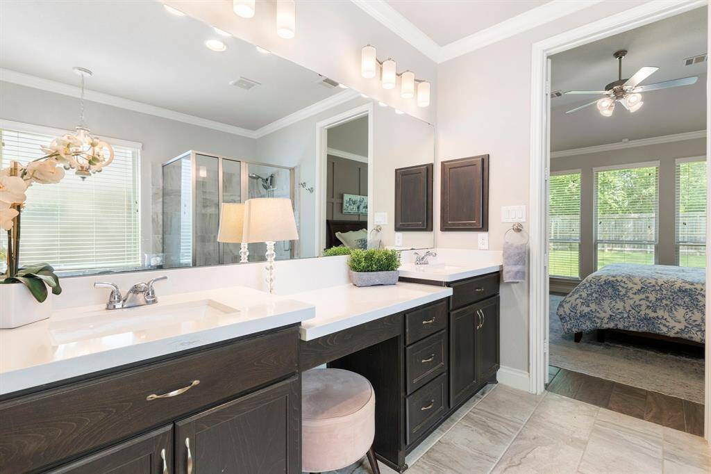 The vanity area offers a stylish and functional space, perfect for getting ready for your day.