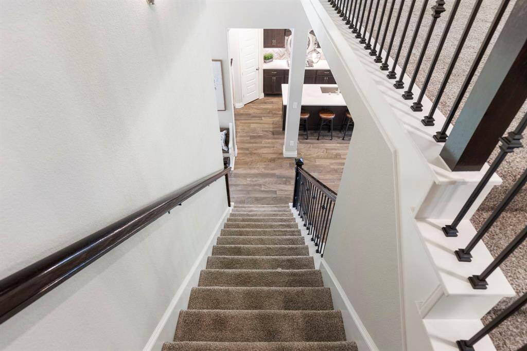 Lovely view of the staircase from the top of the stairs.