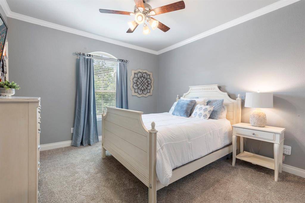 The third upstairs bedroom is chic and bright!