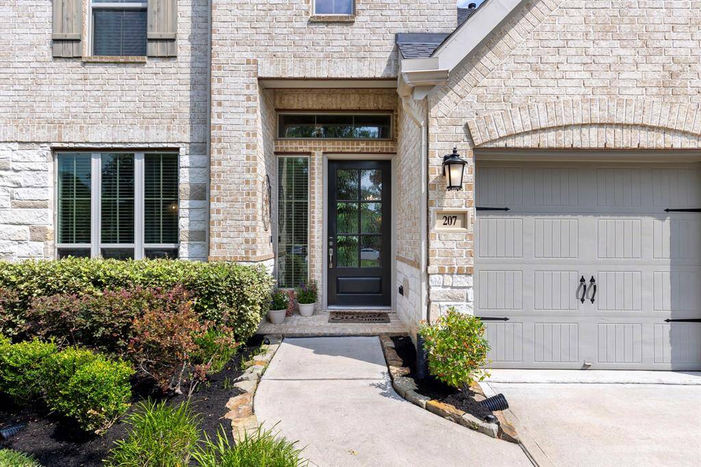 A paved sidewalk entry guides you to the attractive front door, creating a welcoming first impression.