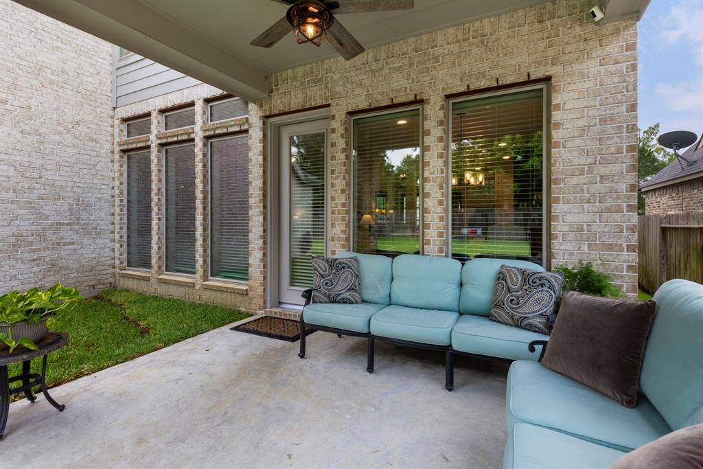 Enjoy your morning coffee while relaxing under the cozy covered back patio.