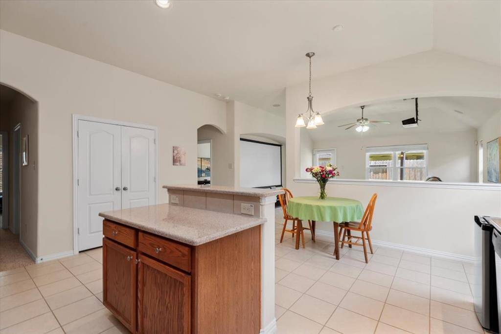 Double door pantry provides plenty of storage space.