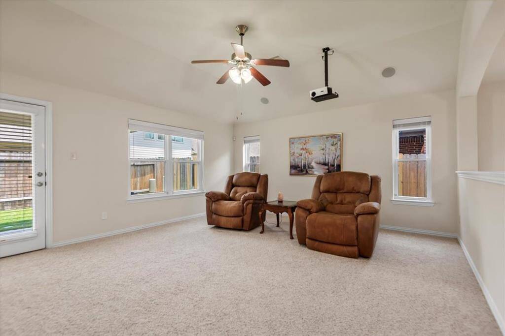 The living room is currently set up as a home theater for streaming movies, shows, etc.