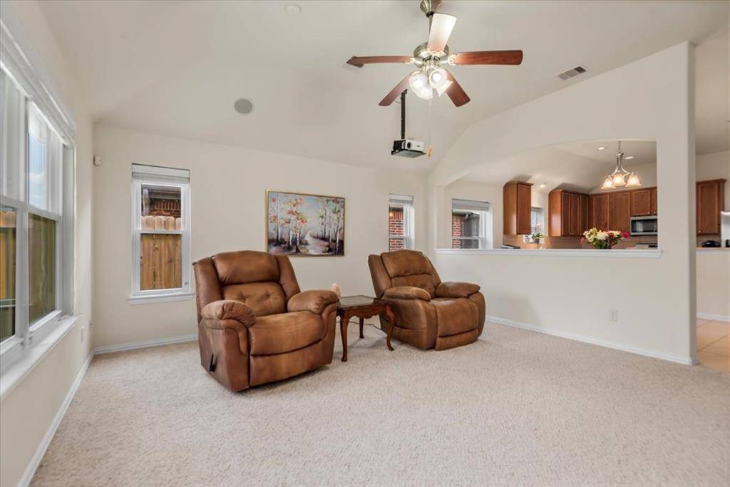 Notice the arched opening into the breakfast room & kitchen.