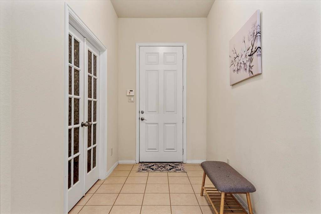 Elegant, entry- front door provides extra privacy.