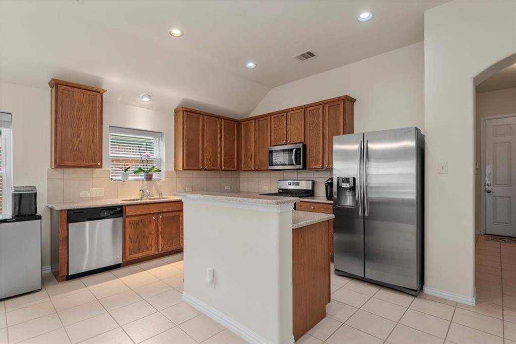 Light, bright island kitchen.