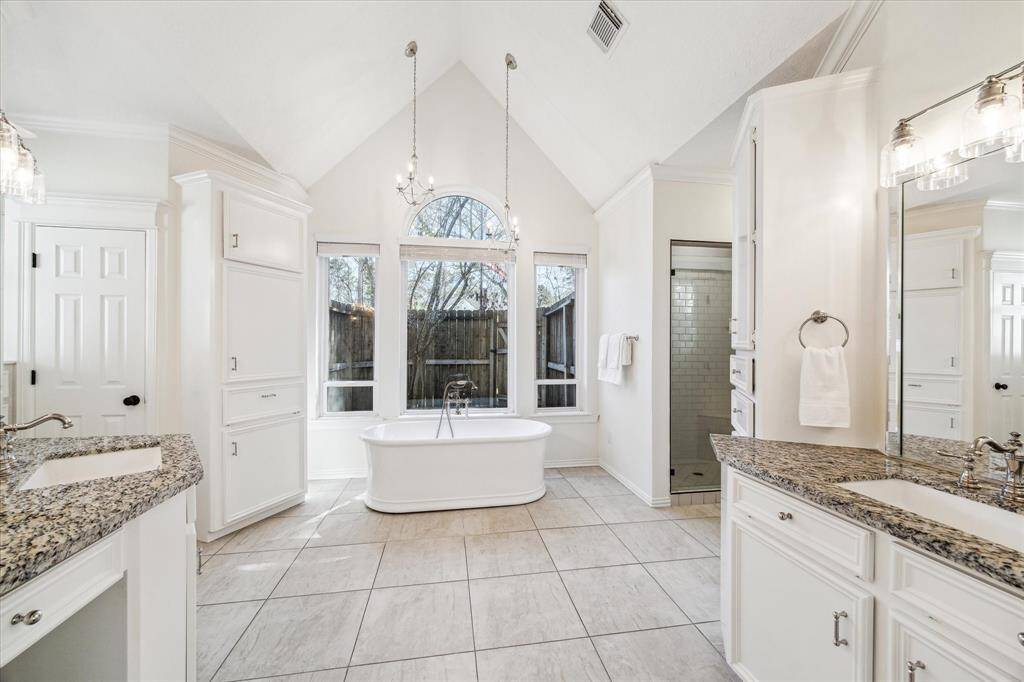 Enjoy your Spa every day.  His/ Her vanities are separate for comfort. What a beautiful bath.