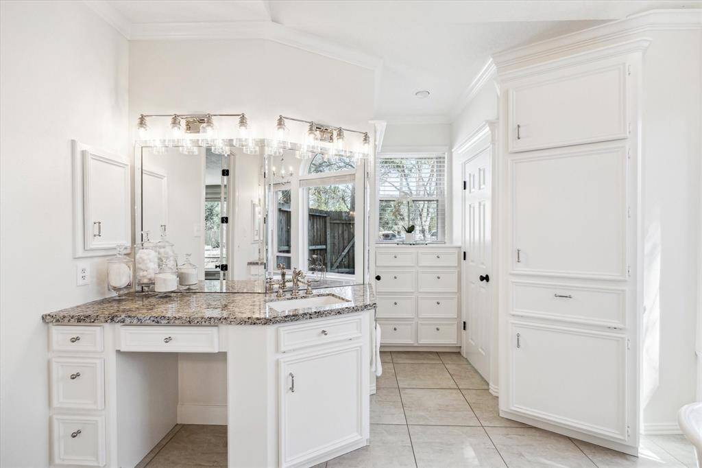 Large vanity area.  Note all the custom built ins.