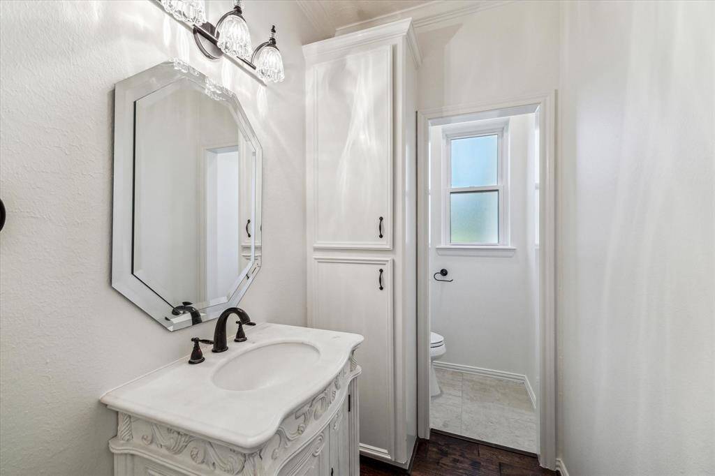 1 of the 2 half baths downstairs.