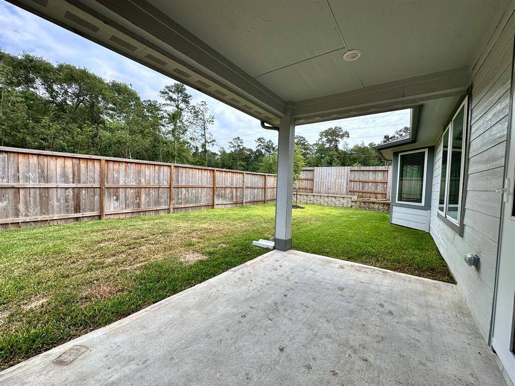 Backyard with Covered Patio.