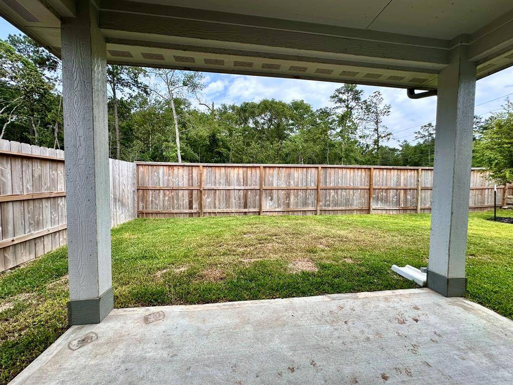 Backyard with Covered Patio.