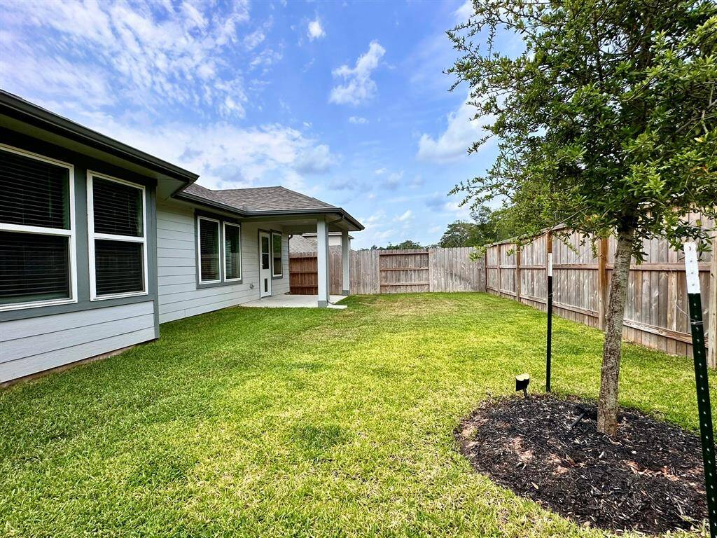 Backyard with Covered Patio.