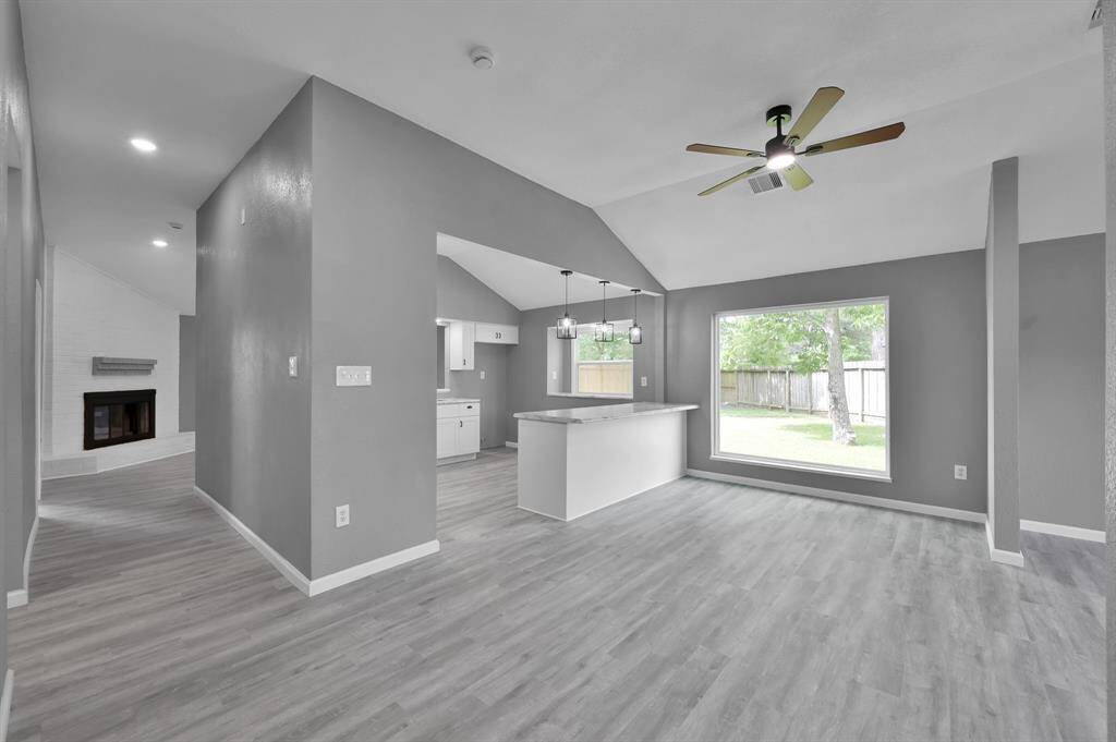 Dining Area, Breakfast Bar, and Slight few of Family room fireplace