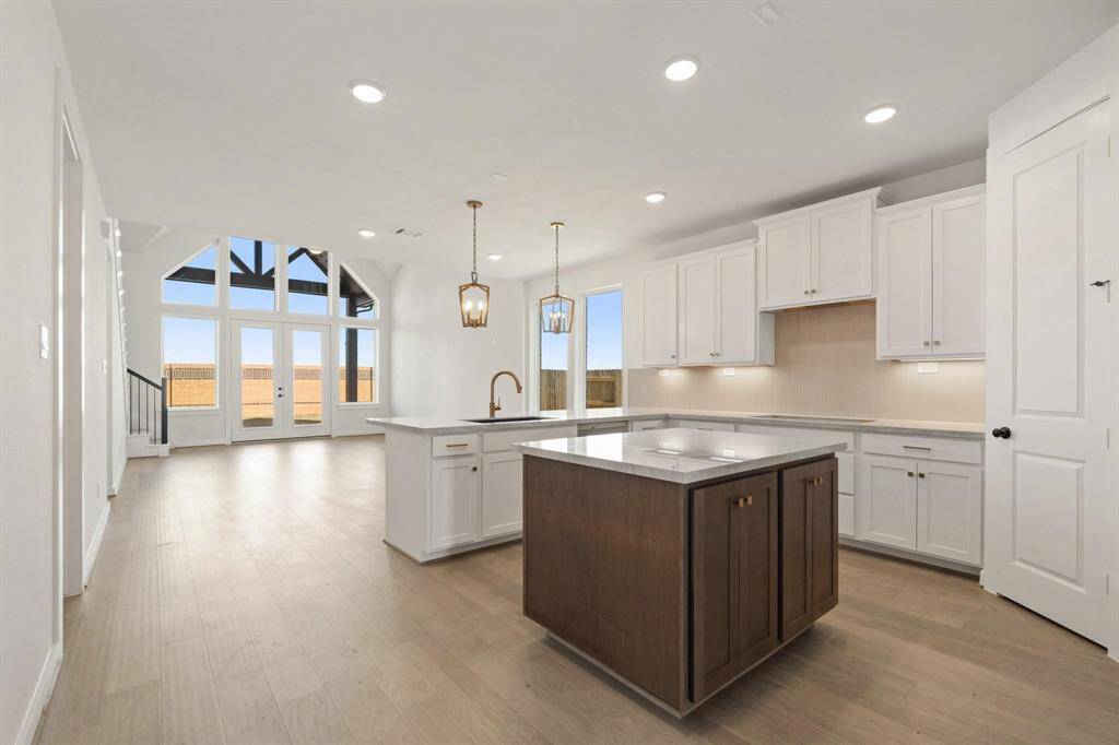 Stunning view of Arched Vaulted Ceiling and spacious kitchen