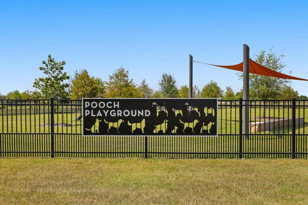 Dog park for large and small breeds with obstacle course and water with shade areas for your fur babay