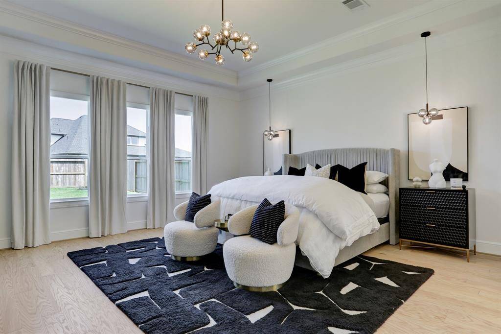 The trayed ceilings in the primary suite are the perfect compliment.