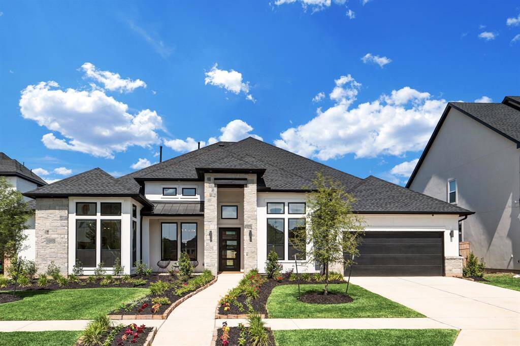 Breath taking and professionally designed 4 bedroom and 4.5 bath one-story home.