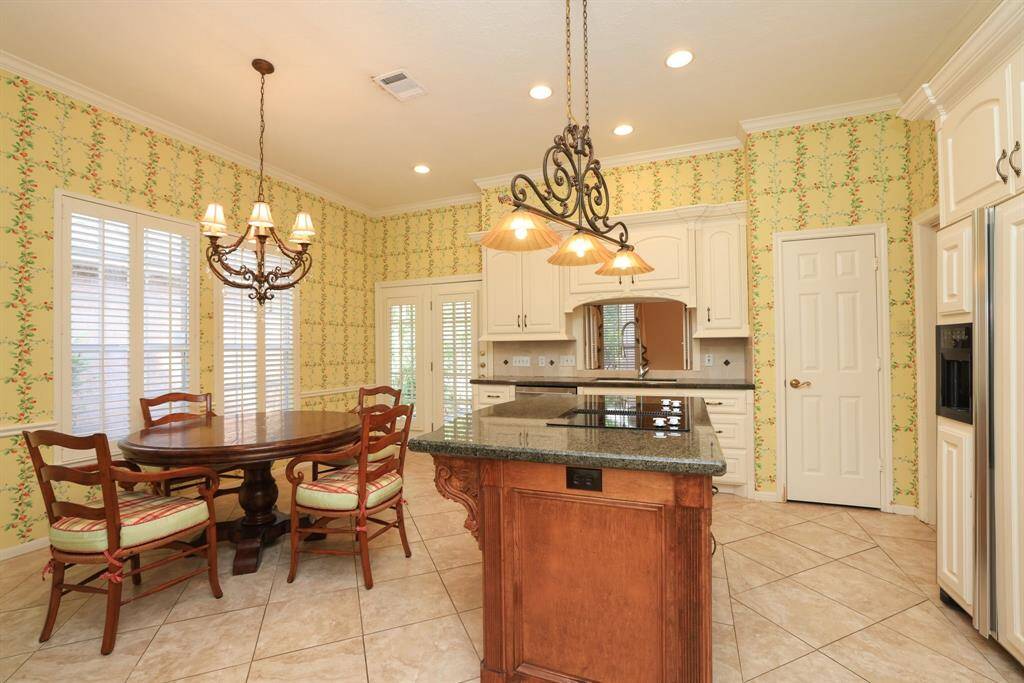 The kitchen includes the refrigerator and offers a cozy casual dining area, table and chairs are included and fit the space perfectly. A great opportunity to repurpose the set and customize it to match your personal décor style.