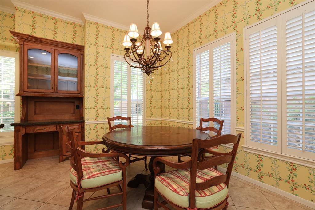 Built-in home desk center is perfect for a homework station or home management hub. The included table and chairs complete the space, making it both functional and ready to use.