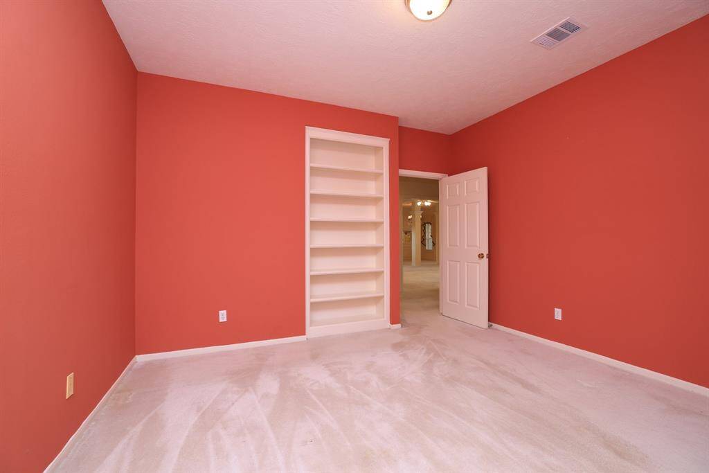 Village Builder Home, noticed the built-ins and extras as your tour this home. This room offers easy access to the secondary bathroom.