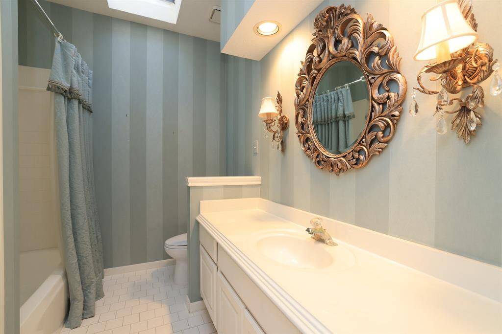 The second full bathroom in the home serves bedrooms 2 and 3/study, offering convenience and functionality for multiple occupants. Additionally, you'll discover a shower-tub combo, combining versatility and comfort for daily use.