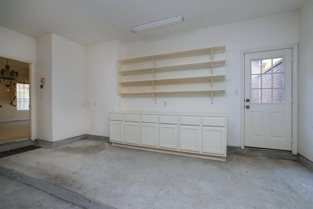 Side door provides convenient interior access, and the extra space offers a great option for a workshop or hobby area.